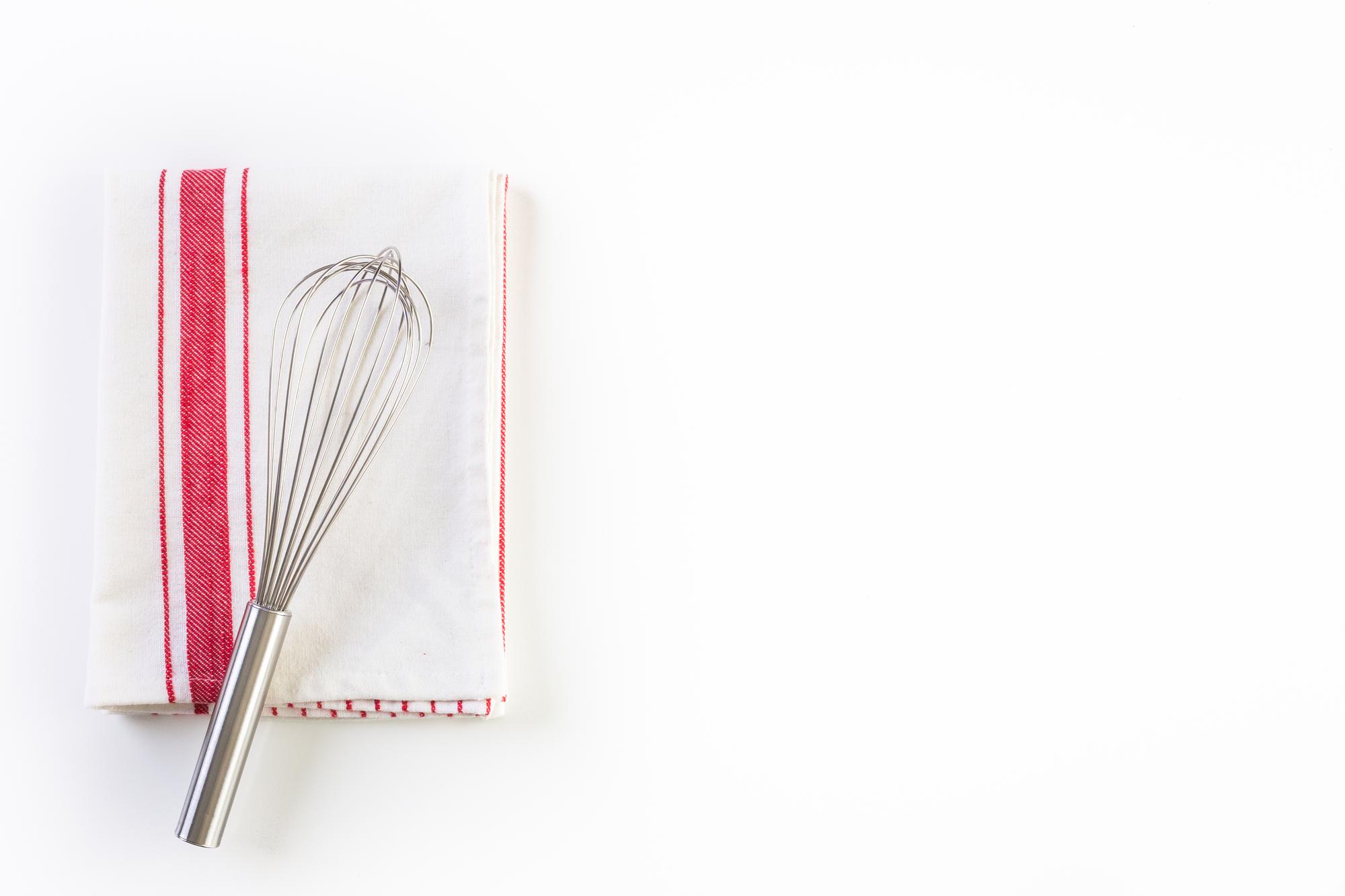 Studio di cucina con attrezzi e ricette